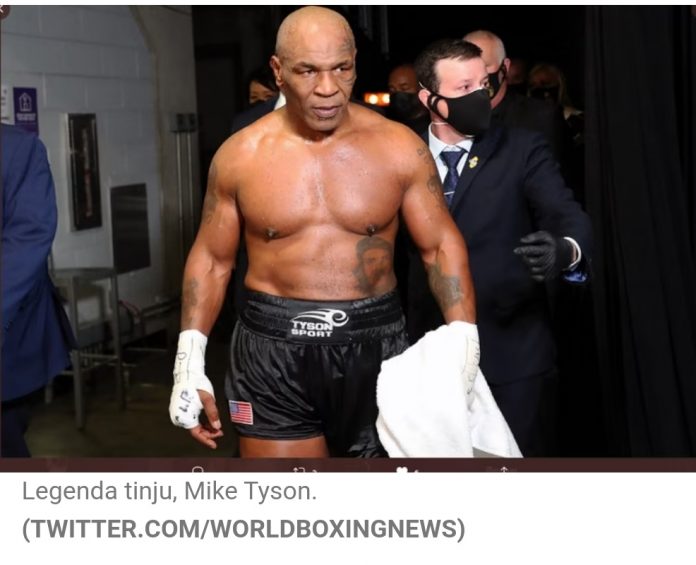 Mike Tyson dilaporkan karena menghajar seorang penumpang pesawat