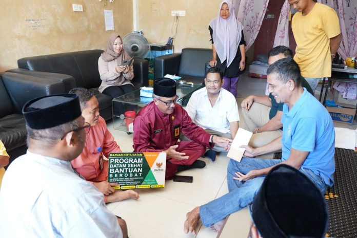 Seorang warga Blok B No. 18 RT 002/001 Tanjung Sengkuang merasa mendapatkan kekuatan tambahan setelah dikunjungi Sekretaris Daerah Kota Batam, Jefridin, Rabu (20/09) f,Pemko Batam