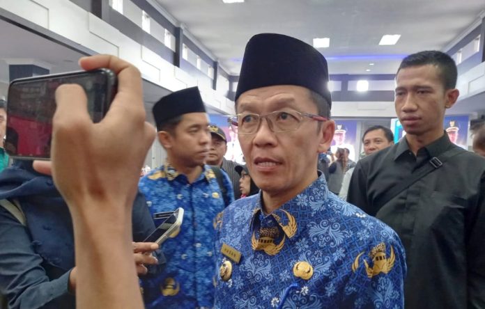 Pj Wali kota Tanjungpinang, Hasan mengatakan Pemko Tanjungpinang memberikan jaminan kesehatan kepada Kelompok Penyelenggara Pemungutan Suara (KPPS) melalui BPJS Kesehatan f,Pemko Tanjungpinang
