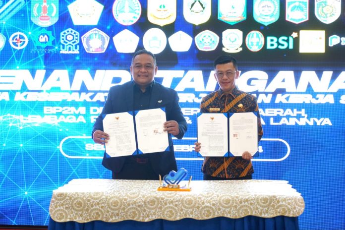 Pemerintah kota Tanjungpinang melakukan Penandatanganan Nota Kesepakatan dan Perjanjian Kerjasama dengan Badan Perlindungan Pekerja Migran Indonesia (BP2MI) di Aula K.H. Abdurrahman Wahid Lantai 1 BP2MI, Selasa (20/02) f,diskominfo Tanjungpinang