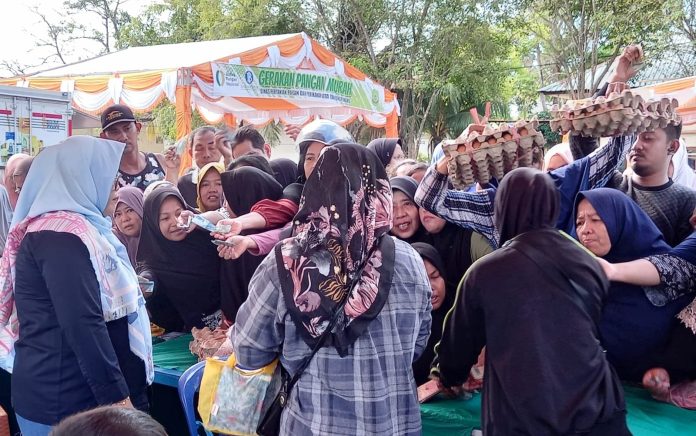 Dinas Pertanian Pangan dan Perikanan (DP3) Kota Tanjungpinang menggelar Gerakan Pangan Murah (GPM) di halaman Kantor Camat Tanjungpinang Kota Jl. Abdul Rahim Kampung Bugis, Sabtu (9/3/2024) f,Pemko Tanjungpinang