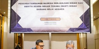 Pemko Terima Hibah ATCS Senilai Rp17.2 Miliar dari Direktorat Jenderal Perhubungan Darat Sekretaris Daerah Kota Batam, Jefridin melakukan Penandatanganan Naskah Perjanjian Hibah dan Berita Acara Serah Terima (BAST) Hibah Barang Milik Negara (BMN) di Holiday Inn & Suites, Selasa (7/05/2024) f,Pemko Batam