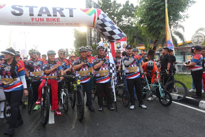 Polres Tanjungpinang menggelar acara Fun Bike di Lapangan Pamedan Tanjungpinang. Minggu (23/6/2024) f, Polresta Tanjungpinang