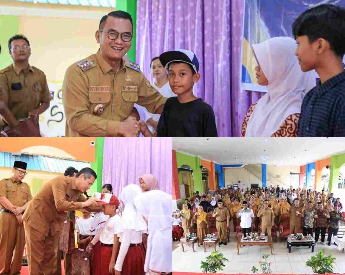 Pemko Tanjungpinang menyerahkan secara simbolis seragam sekolah kepada siswa SD dan SMP Negeri serta Swasta di SMP Negeri 1 Tanjungpinang, Kepulauan Riau, Selasa (24/12/2024). F, Pemkot Tanjungpinang